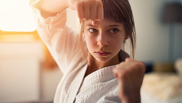 little girl practicing karate